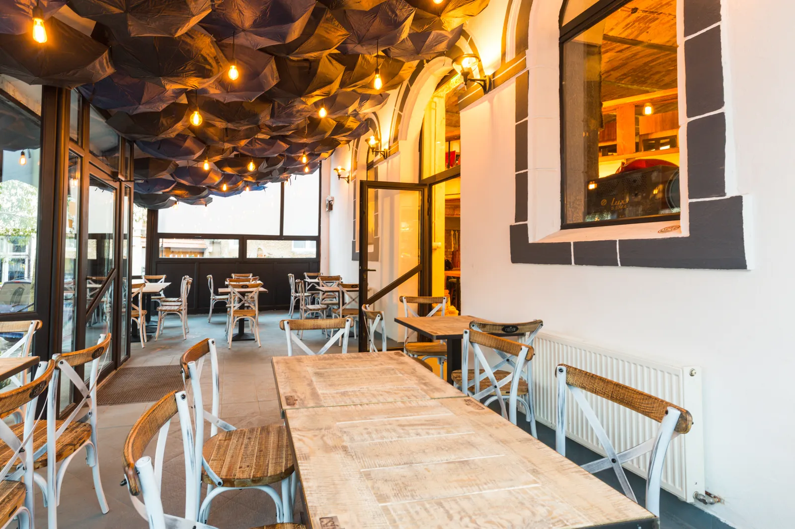 Wooden tables and ceiling inside the original Aftăr Stube